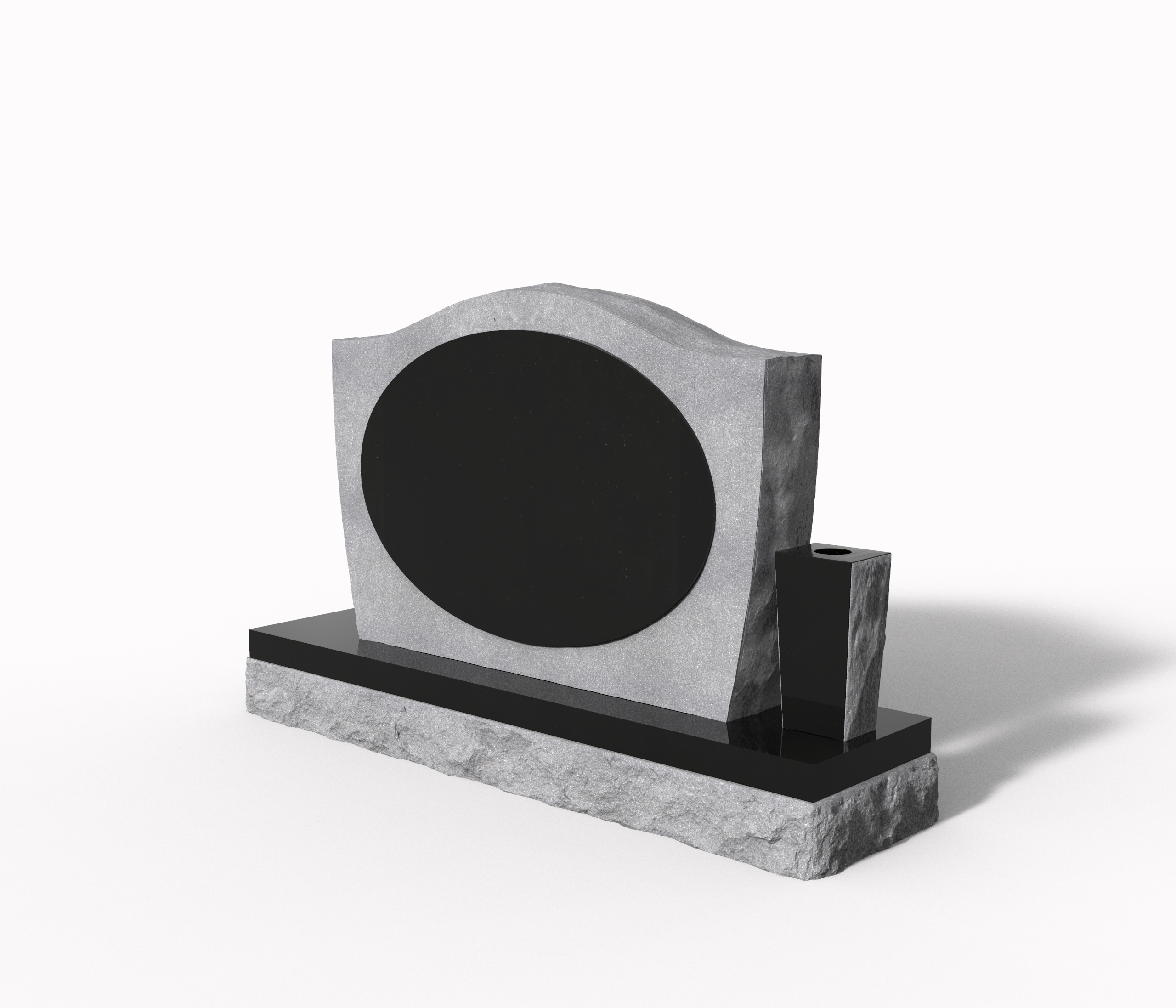 A modern gray granite headstone with a smooth black oval panel ready for engraving, flanked by a polished black vase. The base features a natural rock-pitched edge, combining contemporary design with rugged elegance. Ideal for personalized memorial artwork.