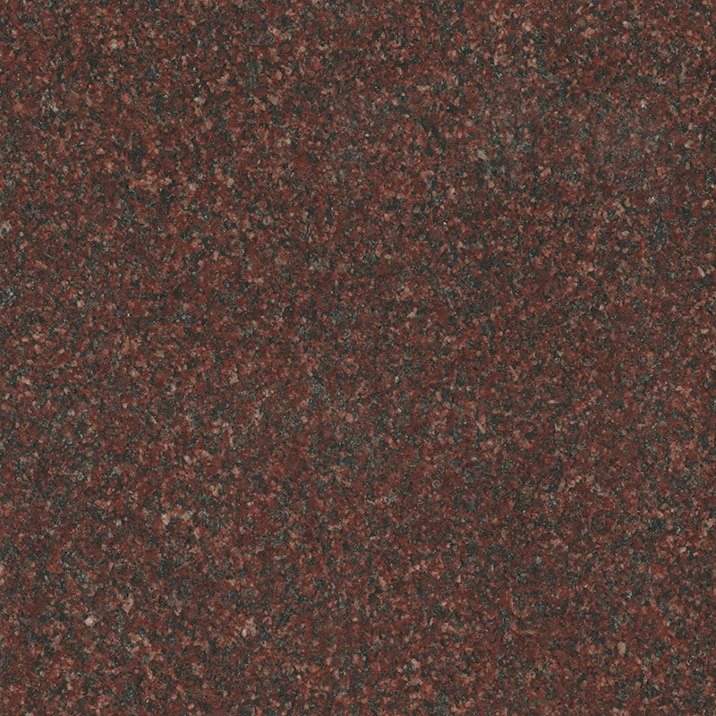 A detailed close-up of a seamless red granite texture, featuring a granular pattern of dark red, black, and grey specks. This natural stone material provides a robust and elegant aesthetic suitable for memorial products.